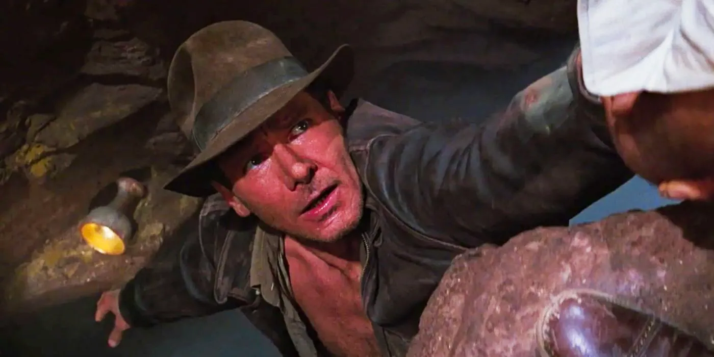 Harrison Ford as Indy reaching for the Holy Grail in Indiana Jones and the Last Crusade. Image