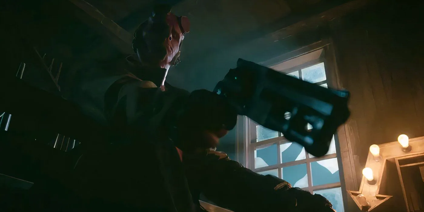 Hellboy points his pistol down at someone in Hellboy: The Crooked Man Image