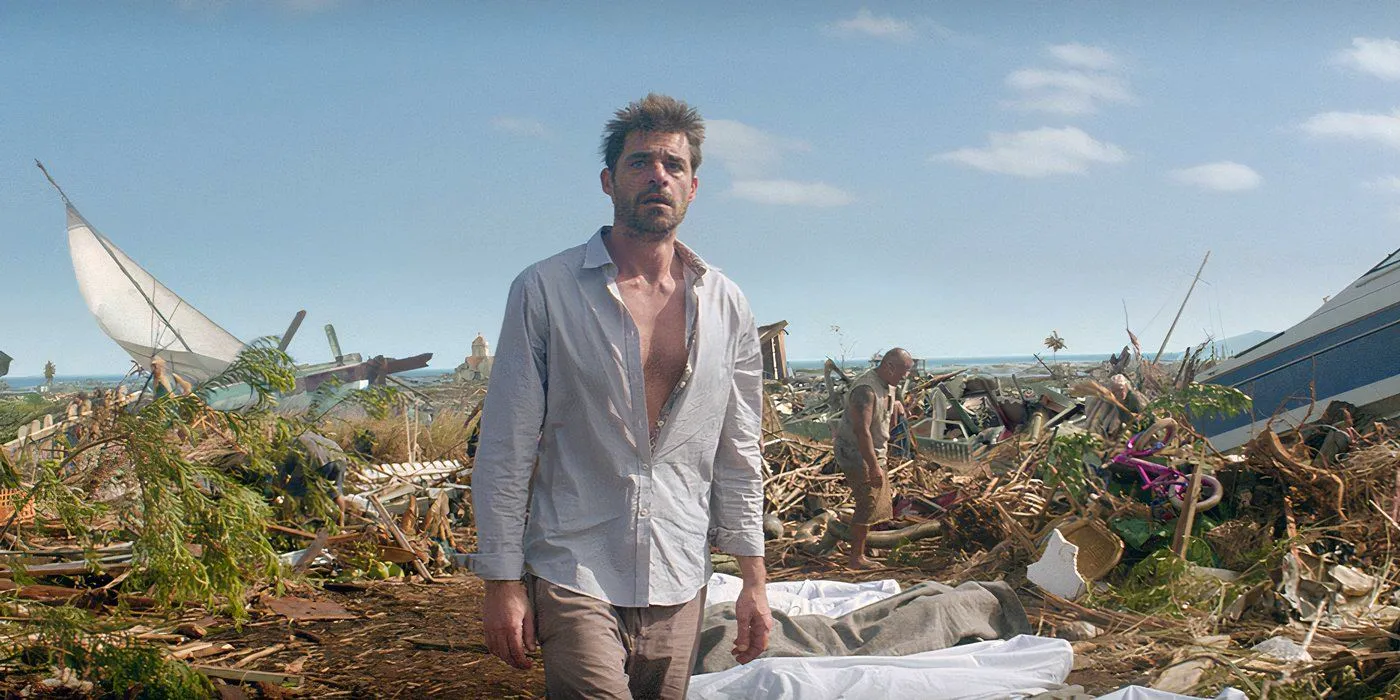 Hereafter (2010)  Man overlooks a beach in which everything is destroyed he looks dishevelled and tired Image