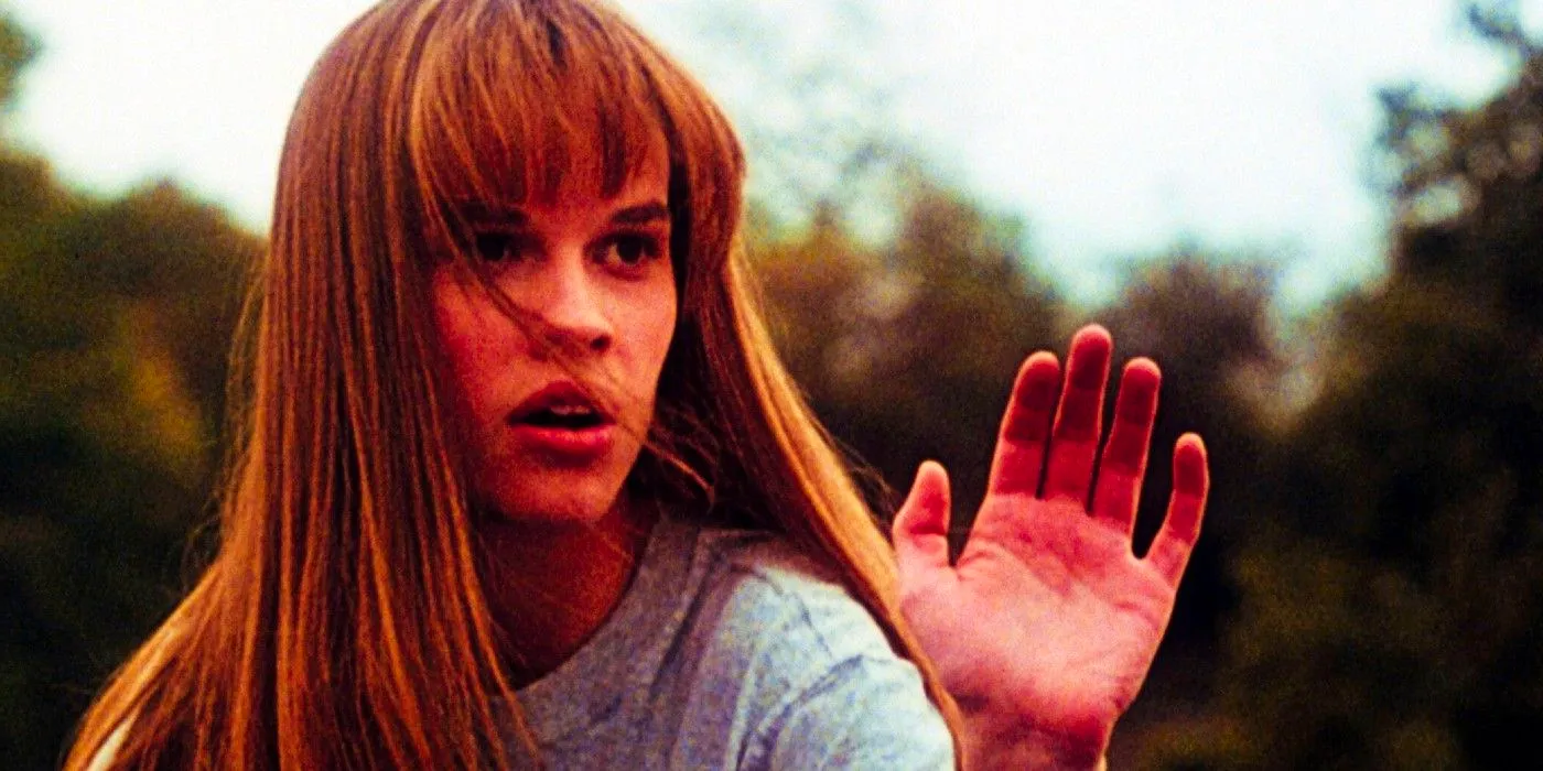 Hilary Swank waving as Julie Pierce in The Next Karate Kid Image