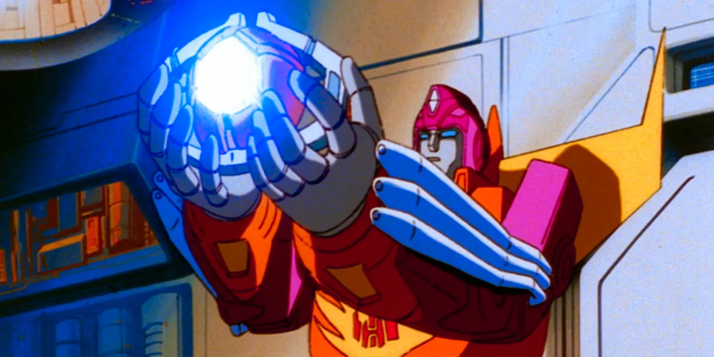 Hot Rod from the original animated Transformers Movie holding the Matrix of Leadership aloft. Image