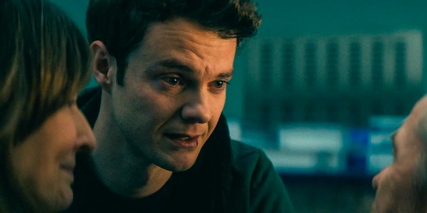 Hughie (Jack Quaid) says goodbye to his father after injecting him with a medication to help him die in The Boys season 4 episode 5 Image