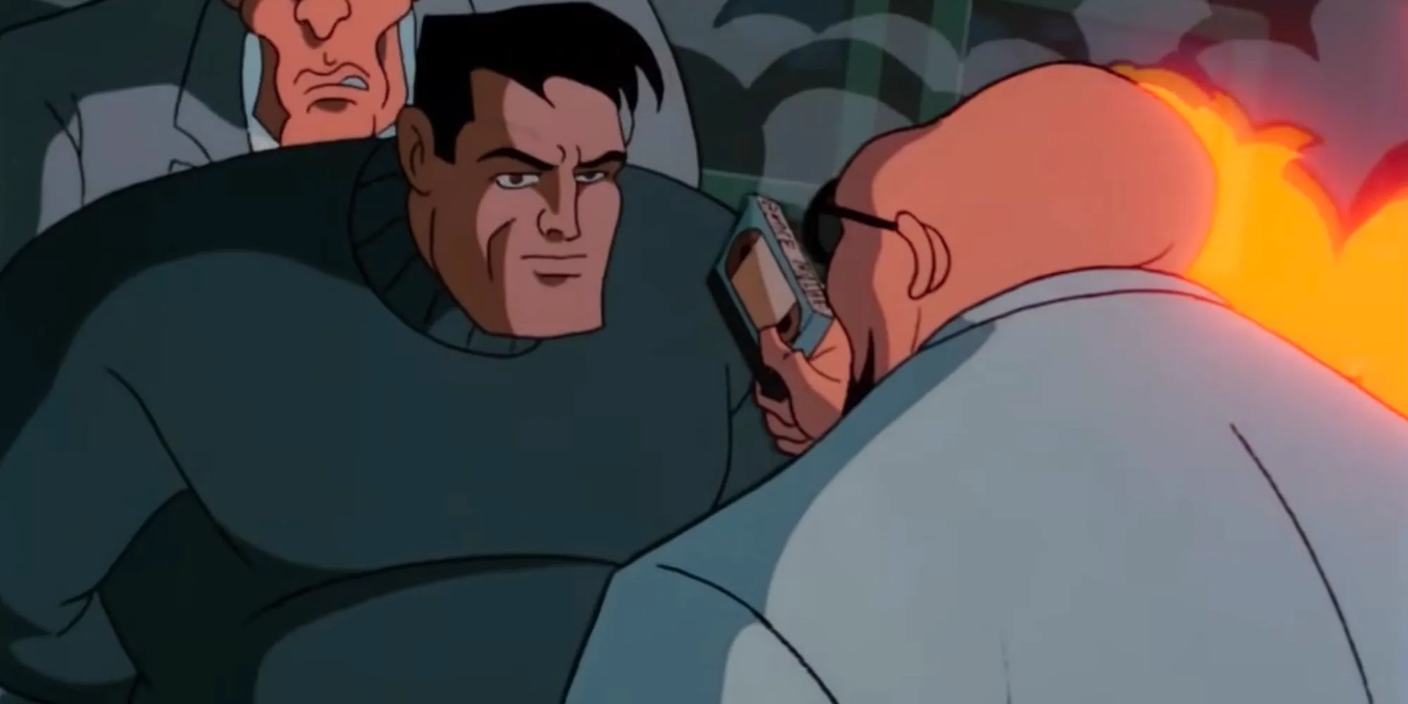 Hugo Strange threatening Bruce Wayne with a VHS tape in The Strange Secret Of Bruce Wayne in Batman The Animated Series Image