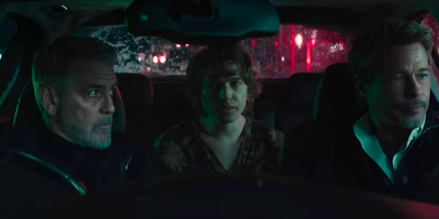 In a car, Nick (Brad Pitt), (Austin Abrams) and Jack (George Clooney) in WOLFS Image