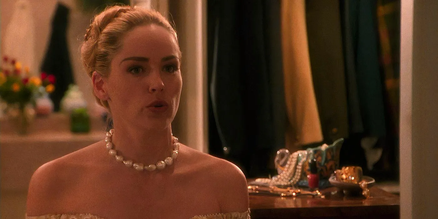 Intersections (1994) Sharon Stone is dressed very elegantly in a very fancy room with an expensive bag and jewellery in the background Image