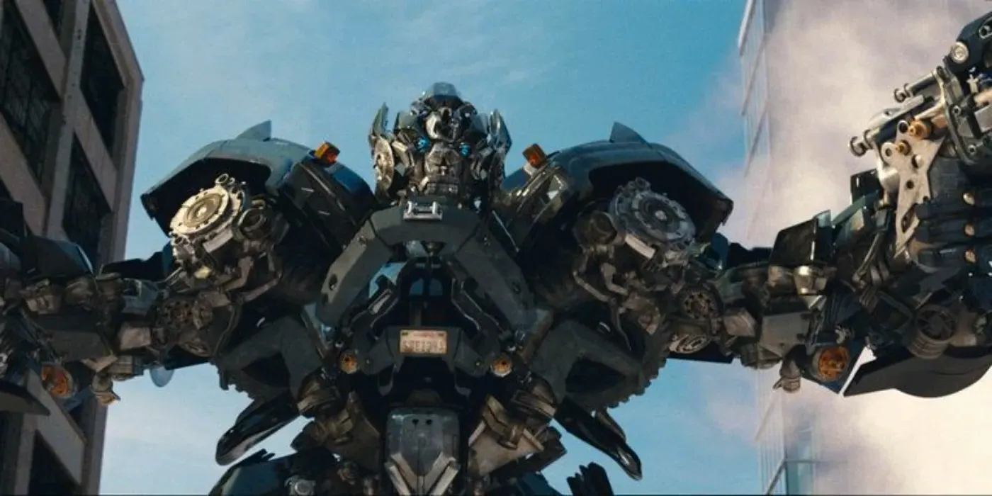 Ironhide in Transformers Dark of the Moon pointing guns. Image