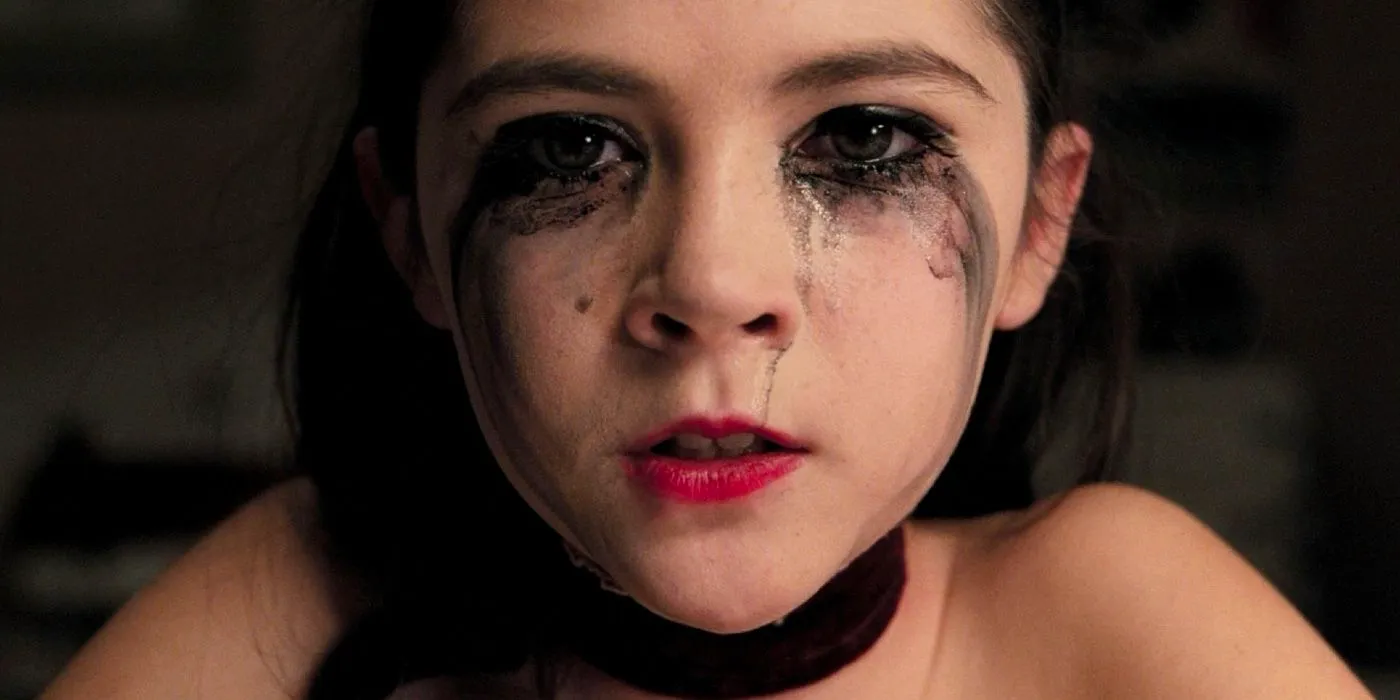 Isabelle Fuhrman with makeup running down her face in Orphan. Image