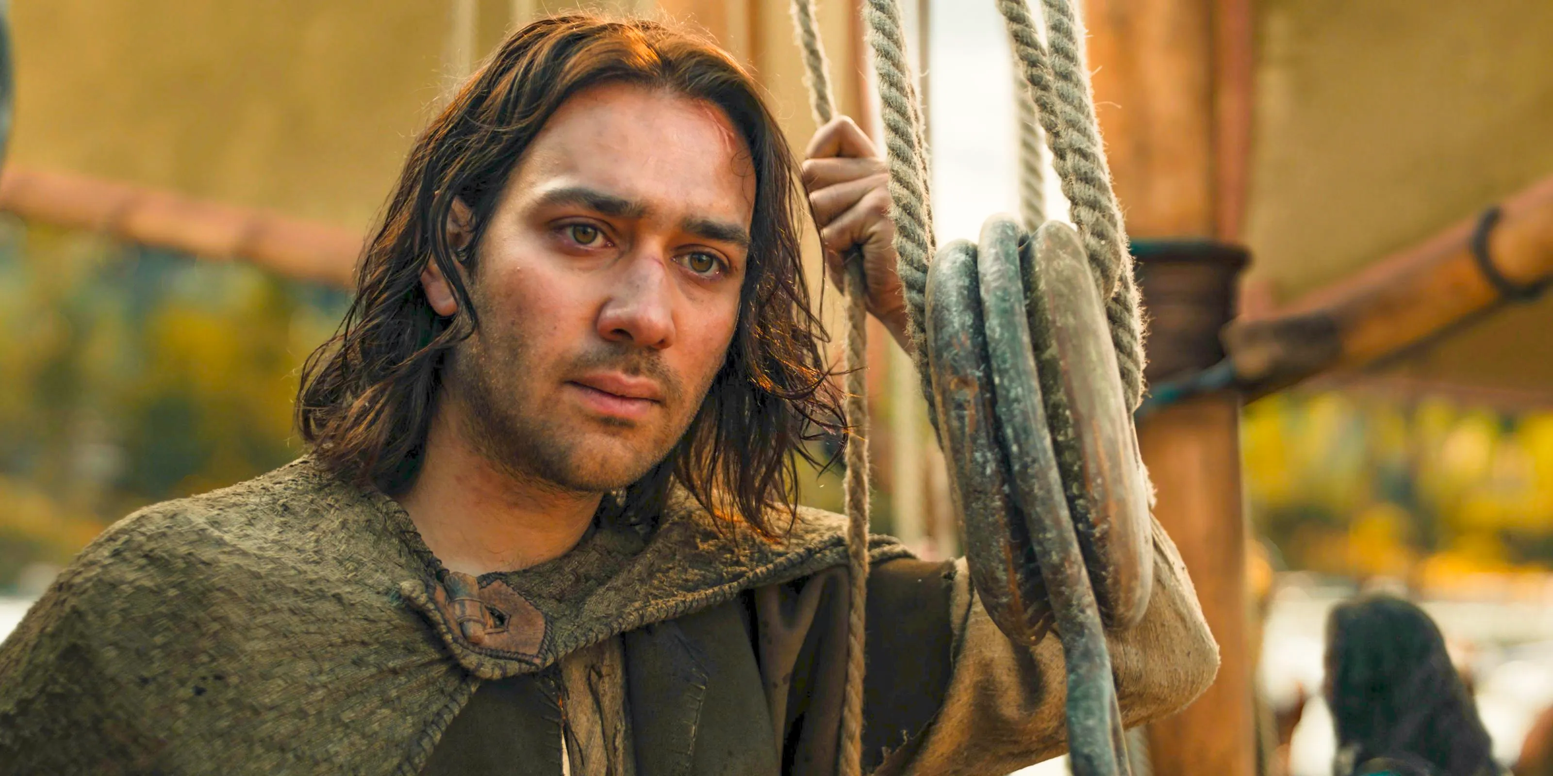 Isildur (Maxim Baldry) looking sad in The Lord of the Rings: The Rings of Power Season 2 Episode 8 Image