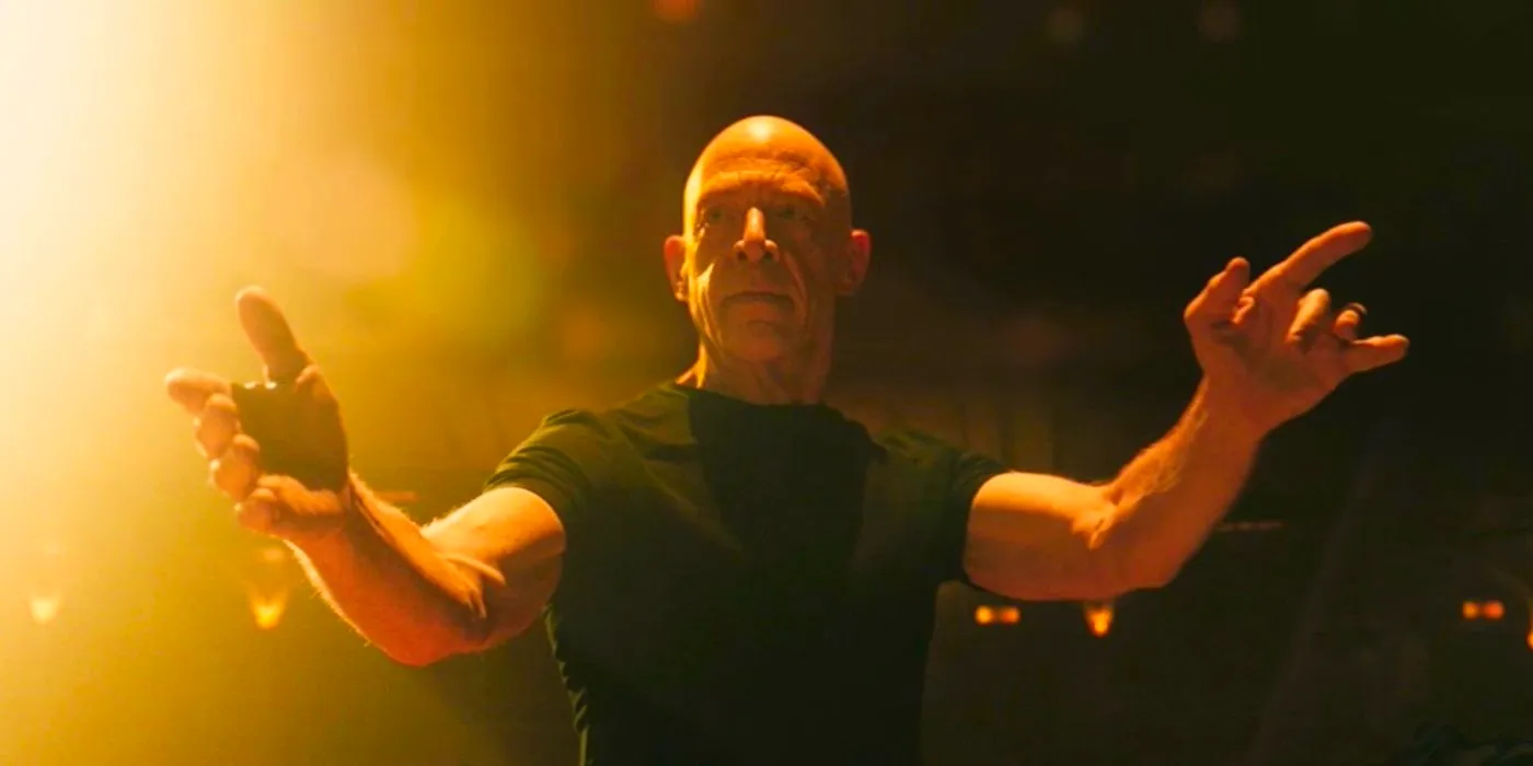 J. K. Simmons as Terence Fletcher composing in Whiplash Image