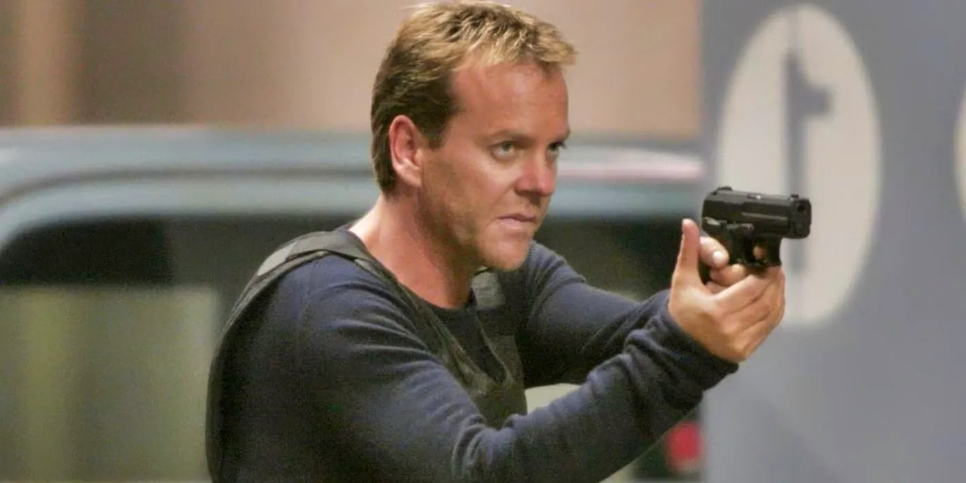 Jack Bauer wearing body armor and pointing a handgun in 24 tv series Image