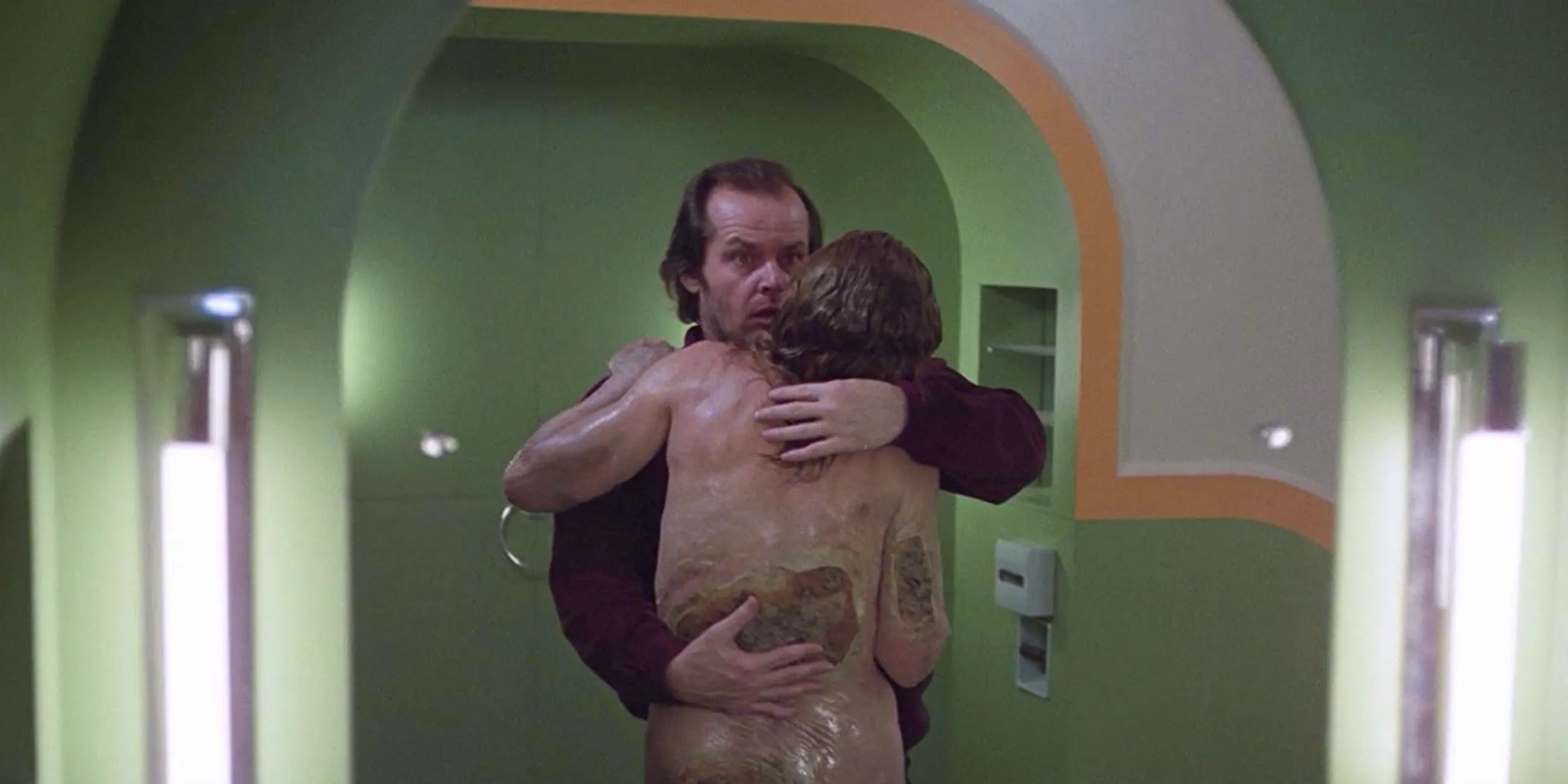 Jack Nicholson kissing the woman from the bathtub in The Shining Image