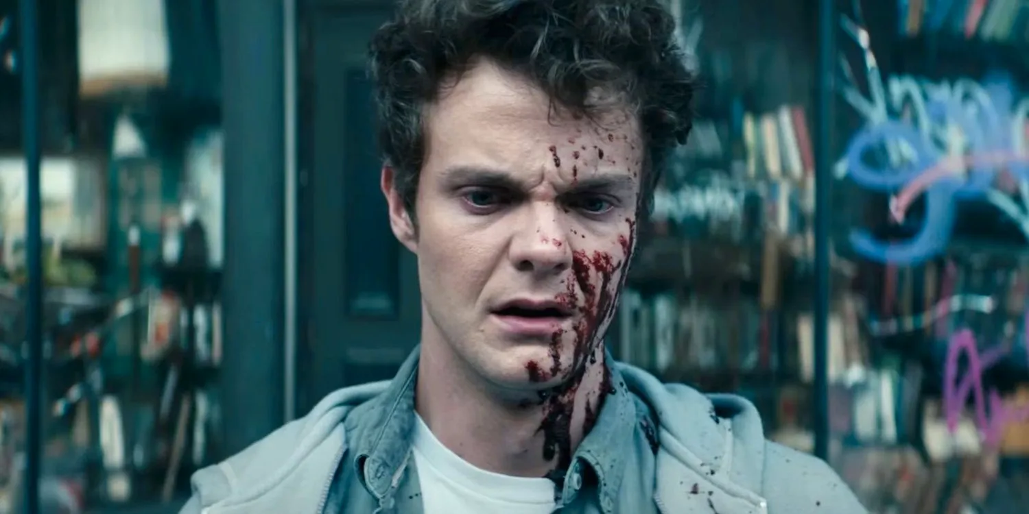 Jack Quaid as Hughie Campbell covered in blood in The Boys Image