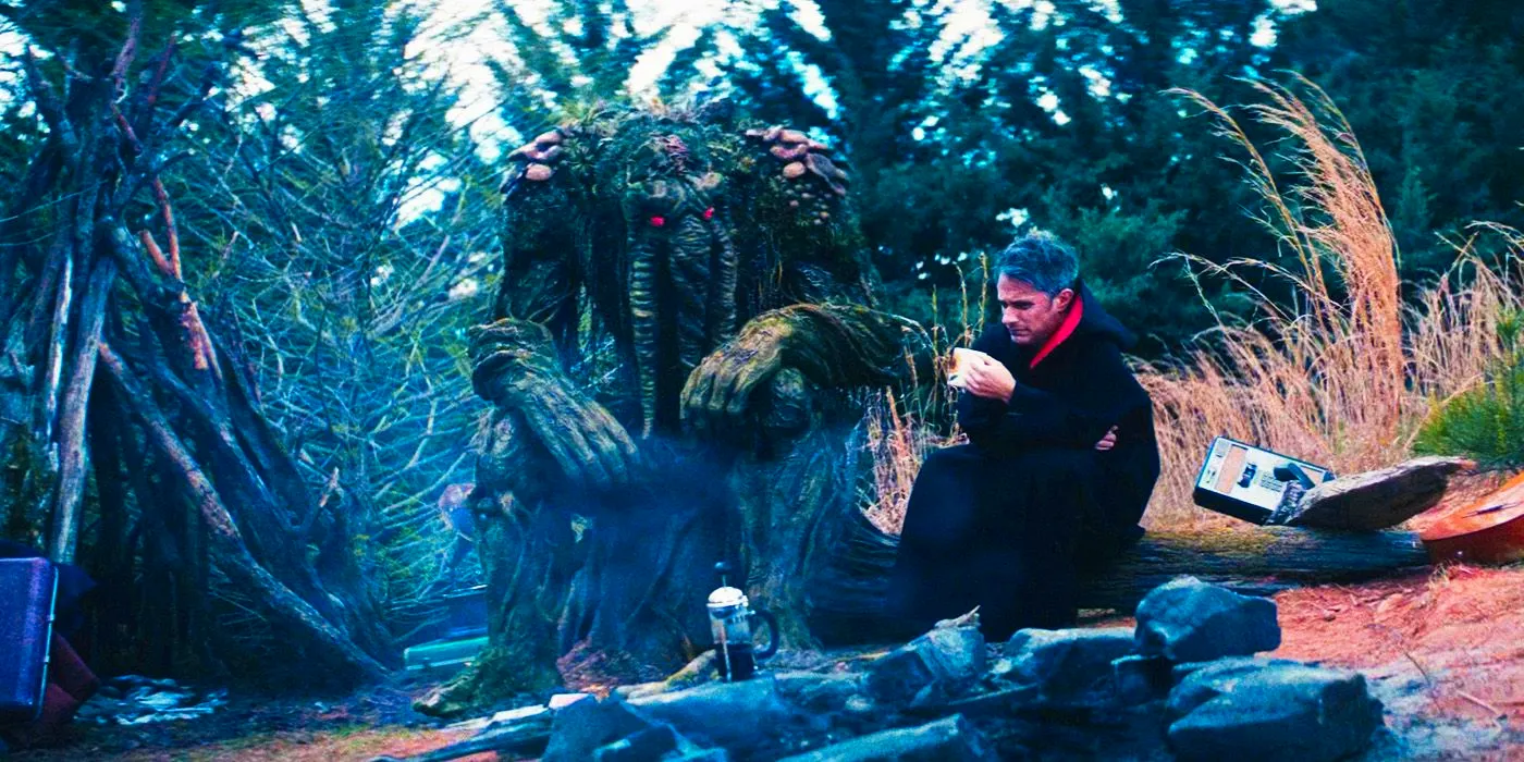 Jack Russell and Man-Thing around a campfire at the end of Werewolf by Night Image