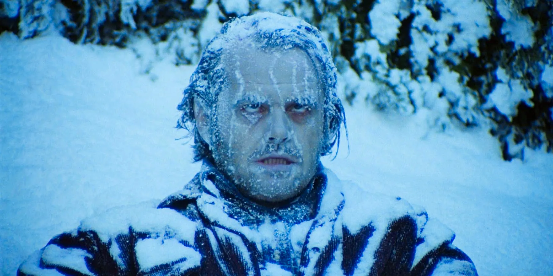 Jack sitting frozen in the snow in The Shining Image