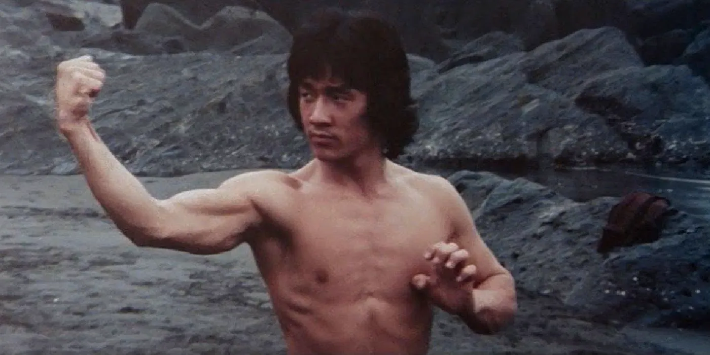 Jackie Chan New Fist of Fury shirtless practicing his kung fu strikes Image