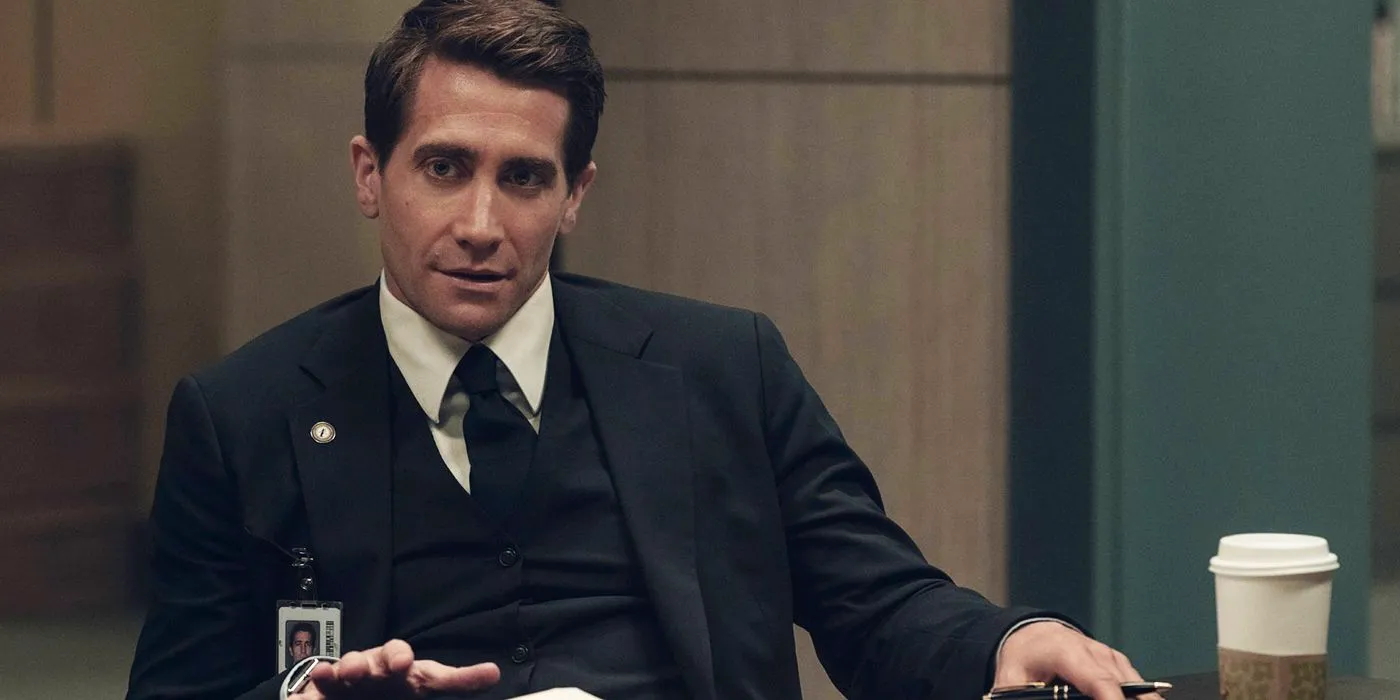 Jake Gyllenhaal in apple tv plus' Presumed Innocent talking behind a desk Image