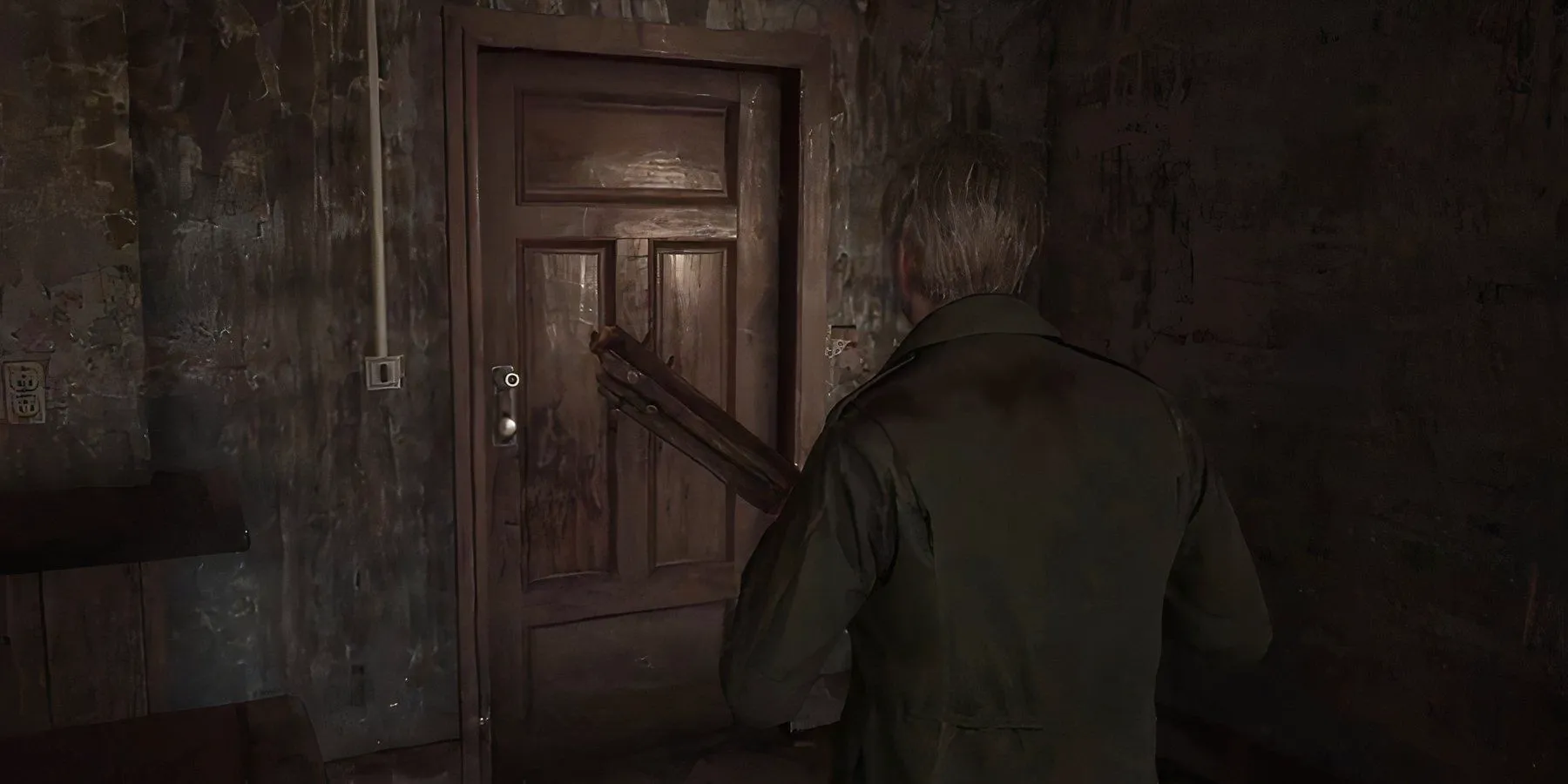 James approaching Neely's Bar Locked Door in Silent Hill 2 Remake. Image