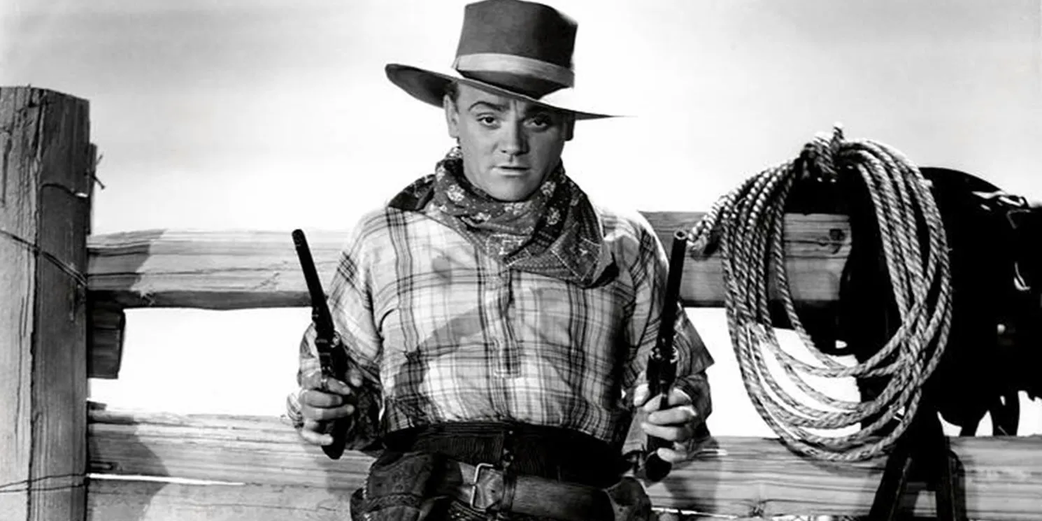 James Cagney wielding dual pistols in The Oklahoma Kid Image