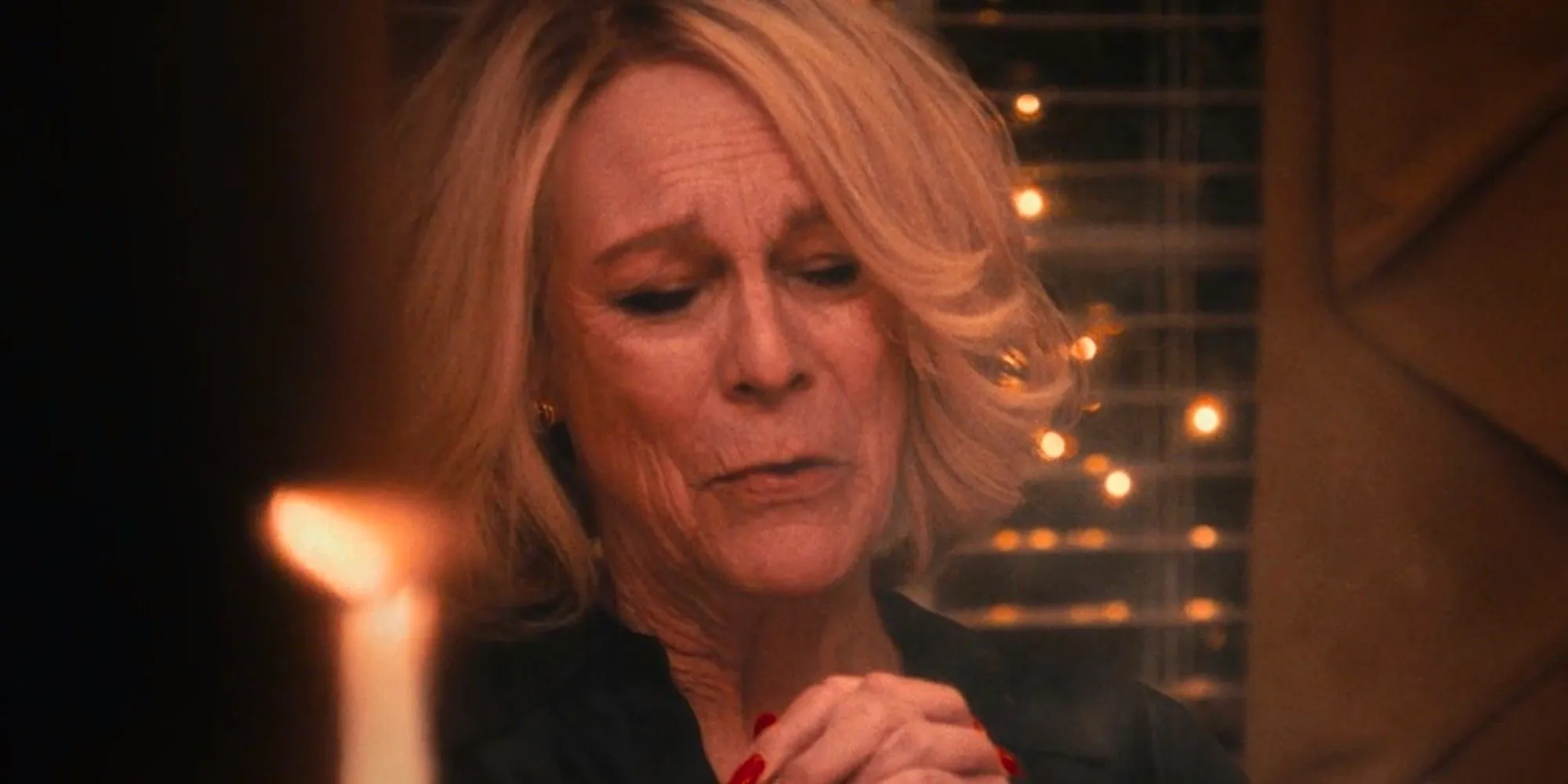 Jamie Lee Curtis as Donna Berzatto sitting at the dinner table in The Bear season 2 Image