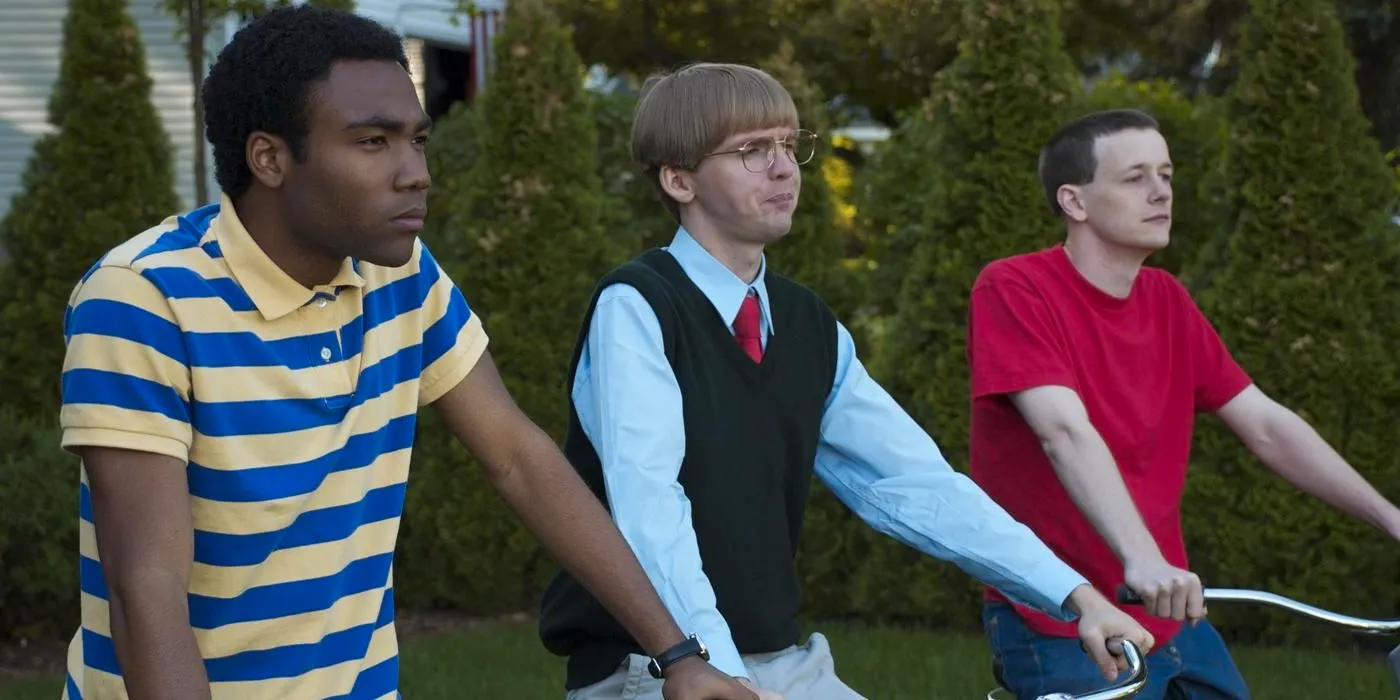 Jason (Donald Glover), Duncan (DC Pierson), and Charlie (Dominic Dierkes) on their bicycles in Mystery Team. Image