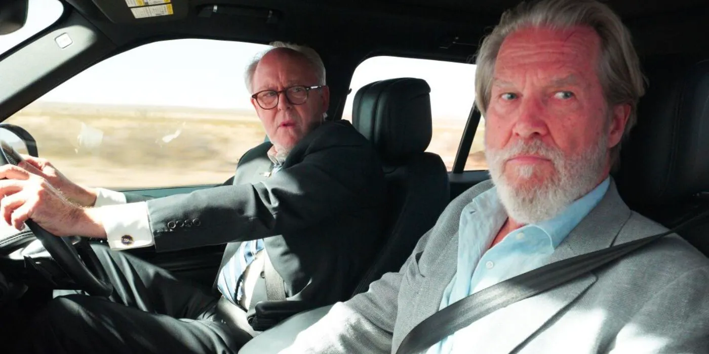 Jeff Bridges and John Lithgow in a car in The Old Man  Image