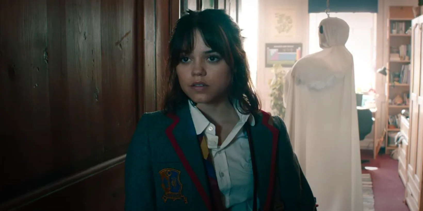 Jenna Ortega in a high school hallway in Beetlejuice Beetlejuice Image