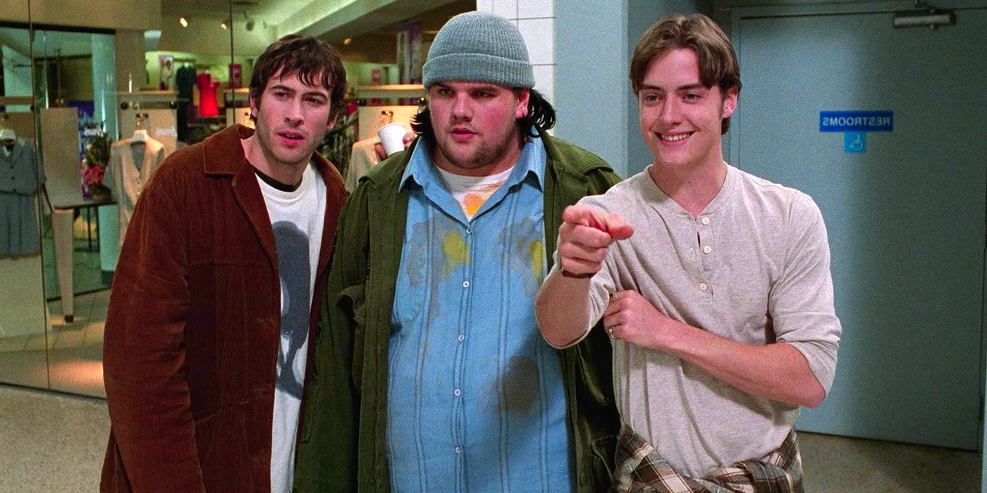 Jeremy London, Ethan Suplee and Jason Lee looking at a magic eye poster in Mallrats Image