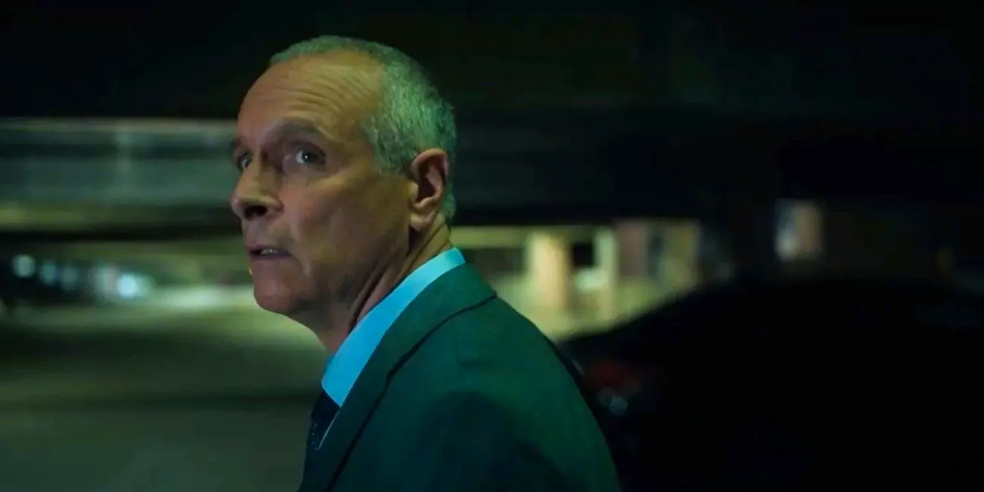 Jerry Vincent standing in a parking garage in Lincoln Lawyer. Image