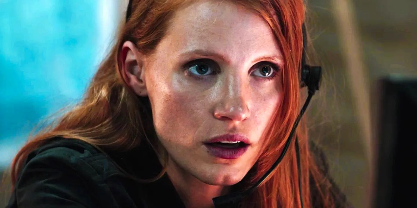 Jessica Chastain looking intently with a headset on in Zero Dark Thirty Image