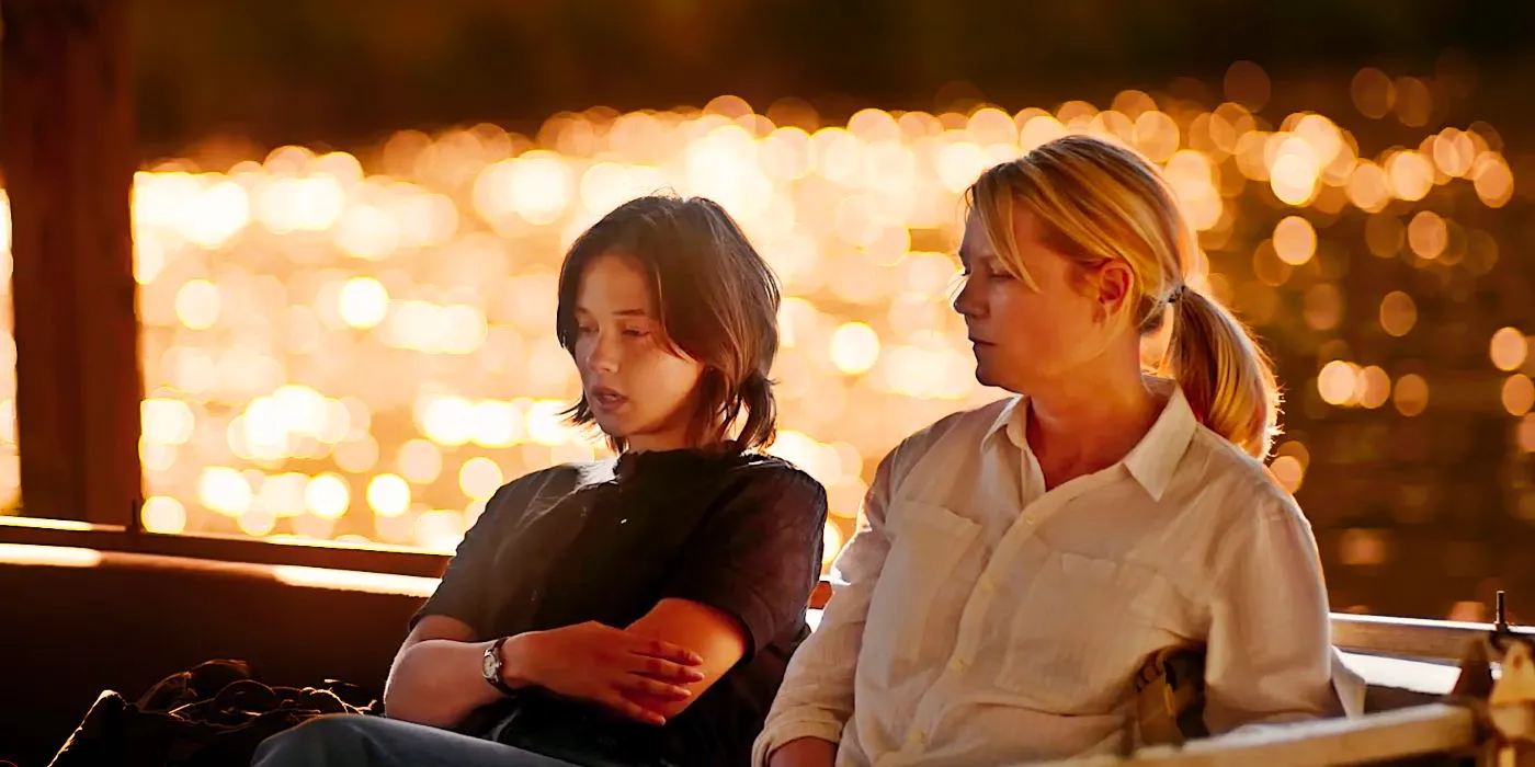 Jessie and Lee sitting while next to a lake in Civil War Image