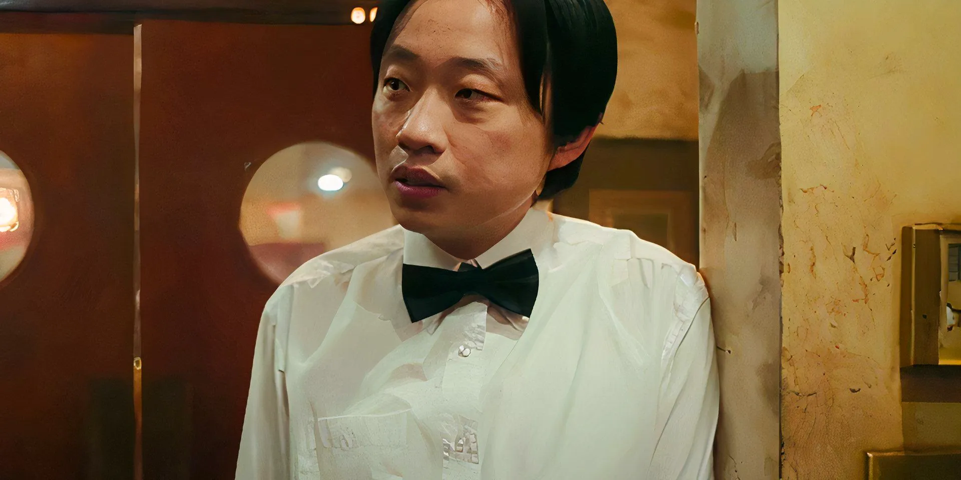 Jimmy O. Yang in Interior Chinatown while waiting in the kitchen Image