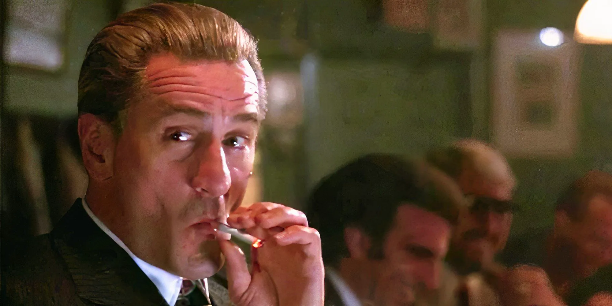 Jimmy smoking at the bar in Goodfellas Image