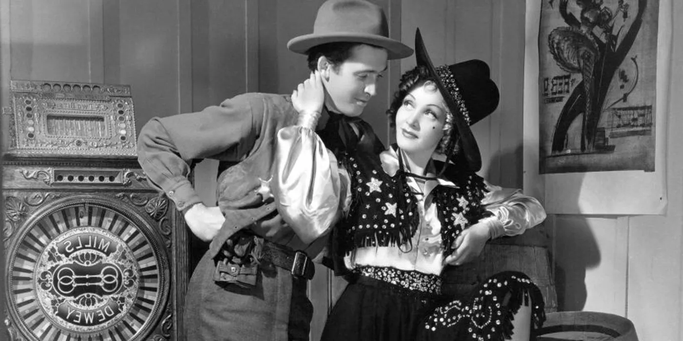 Jimmy Stewart and Marlene Dietrich in Destry Rides Again Image