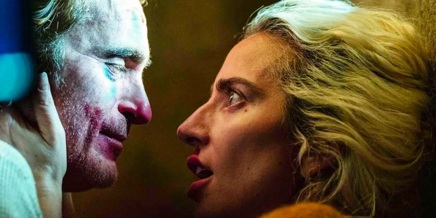 Joaquin Phoenix as Arthur Fleck/Joker and Lady Gaga as Harley Quinn in an intimate moment in Joker Folie a Deux pic Image