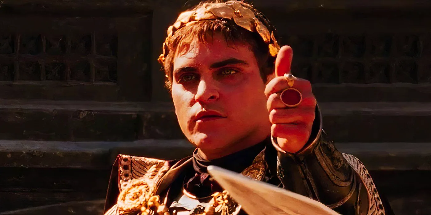 Joaquin Phoenix as Commodus sticking his hand out in Gladiator Image