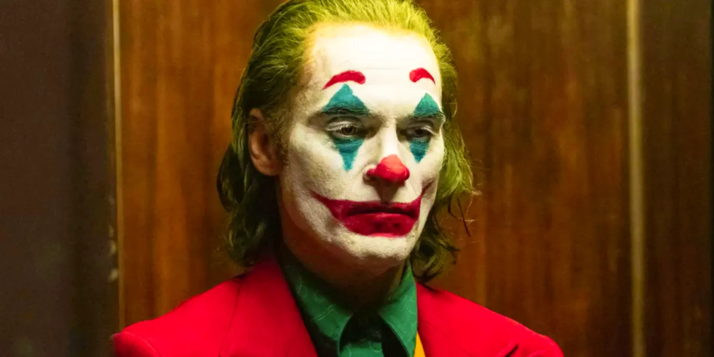 Joaquin Phoenix's Joker looking serious in full makeup Image