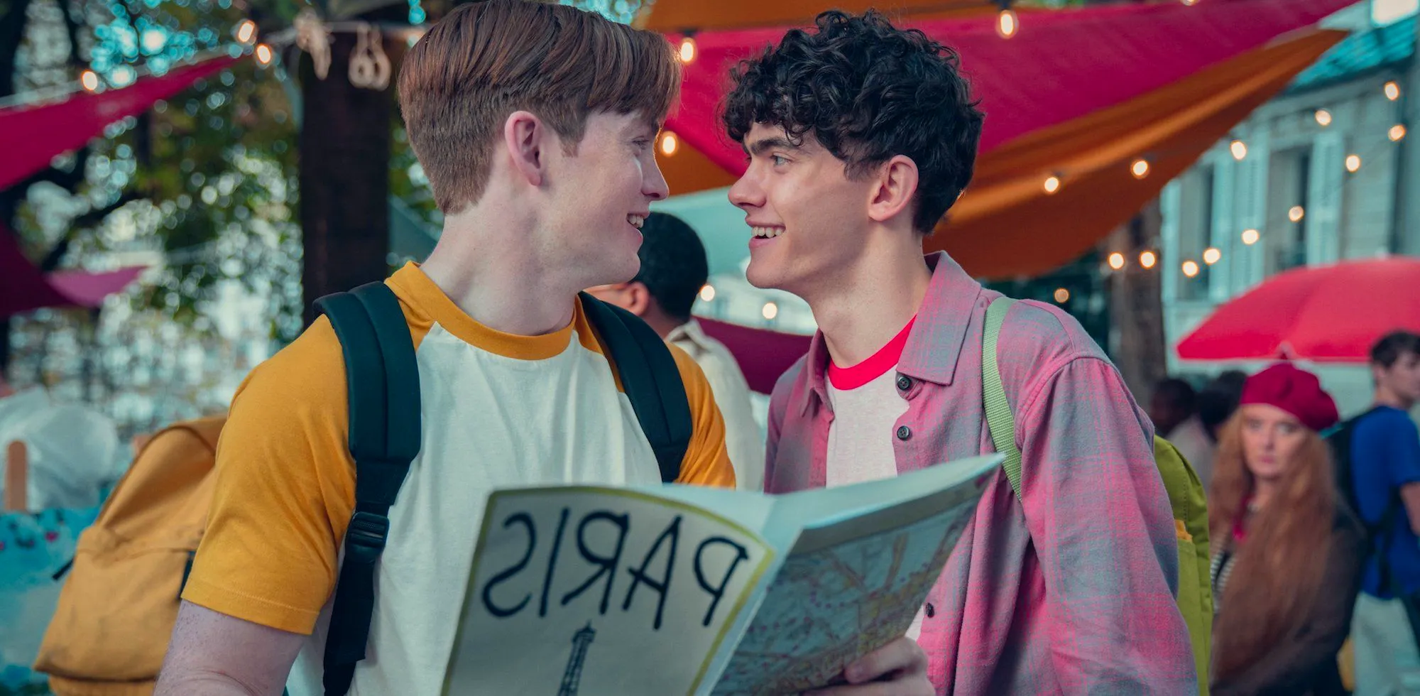 Joe Locke as Charlie and Kit Connor as Nick in Paris in Heartstopper Season 2 Image