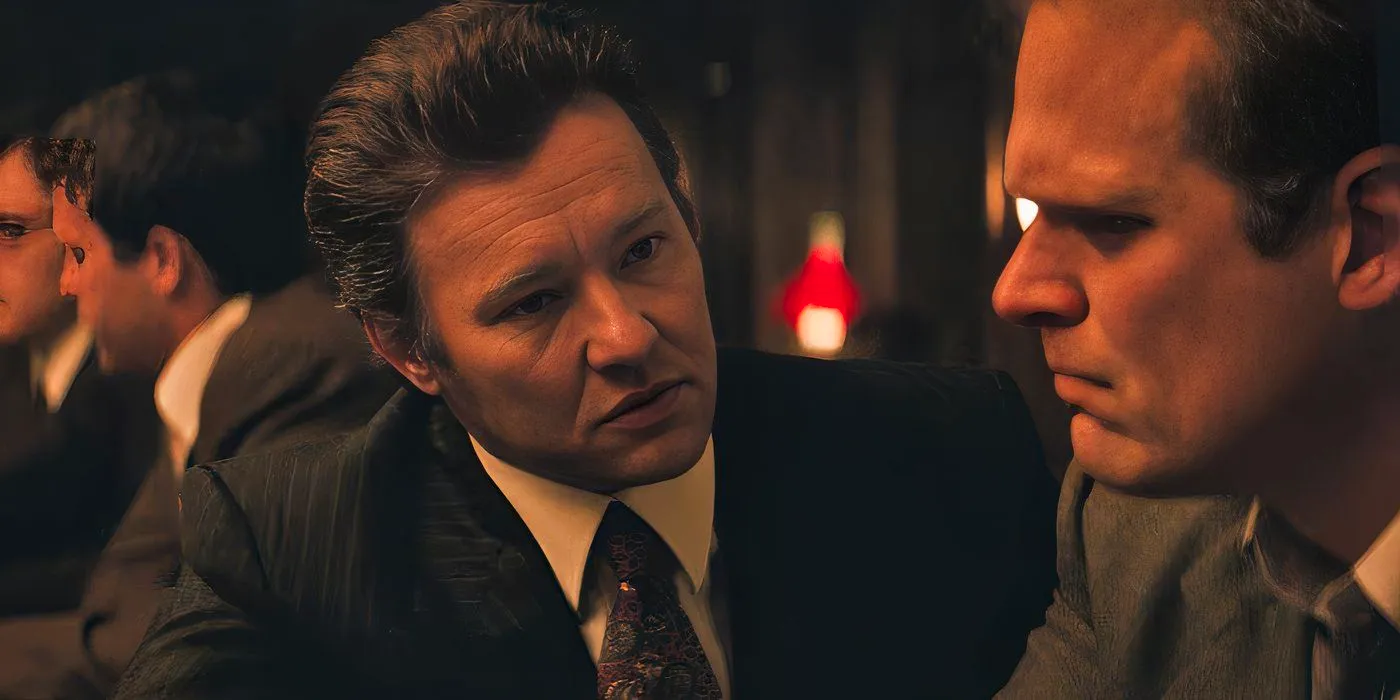 Joel Edgerton as John Connolly sitting at a bar in Black Mass Image