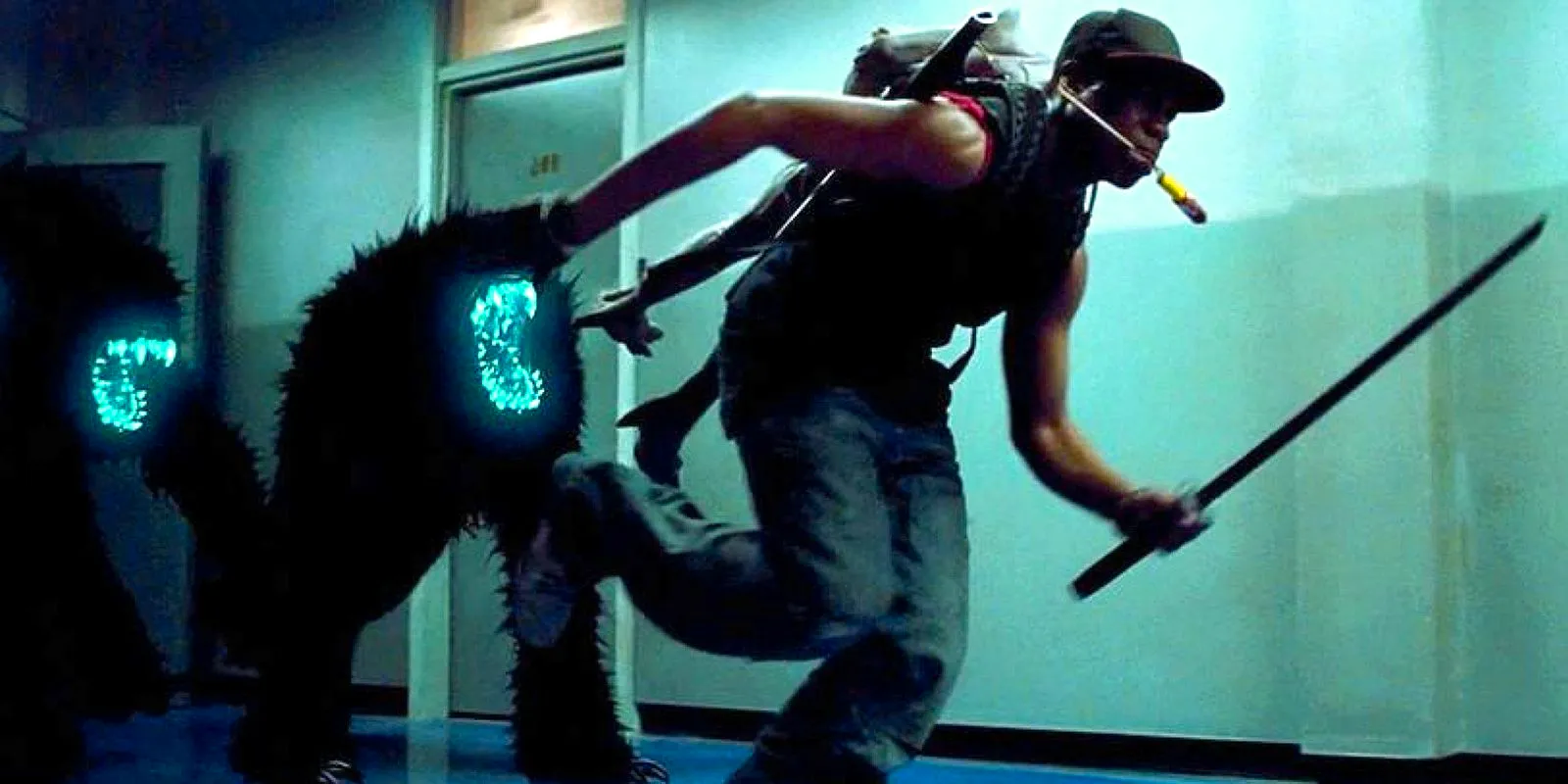 John Boyega running from aliens with a sword in Attack the Block Image