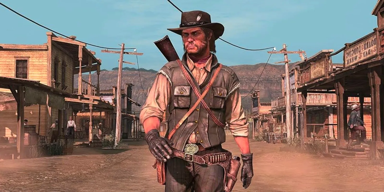 John Marston strolling down a western main street in Red Dead Redemption. Image