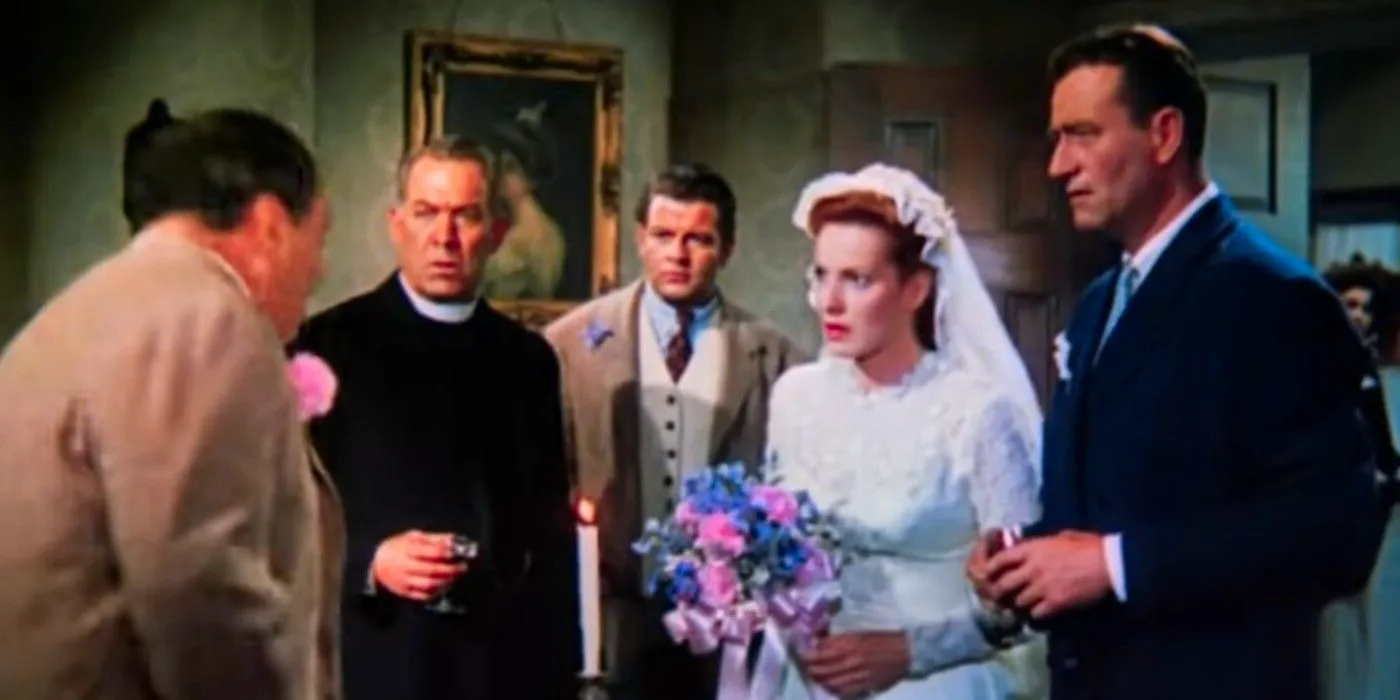 John Wayne as Sean Thornton & Maureen O'Hara as Mary Kate Danaher getting married in The Quiet Man (1952)  Image