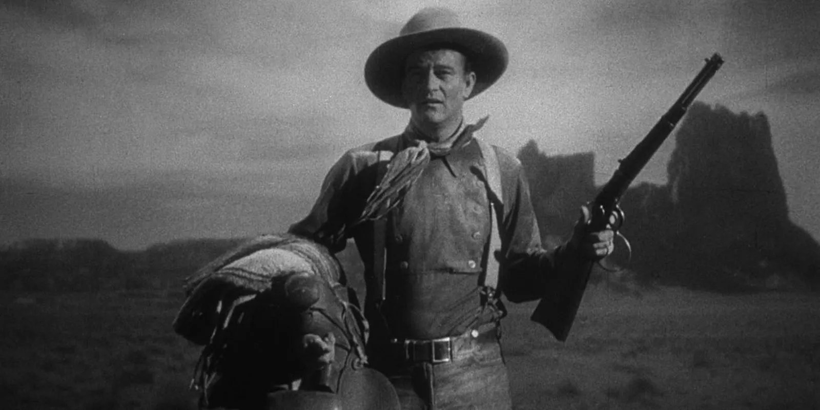 John Wayne with a rifle in Stagecoach Image