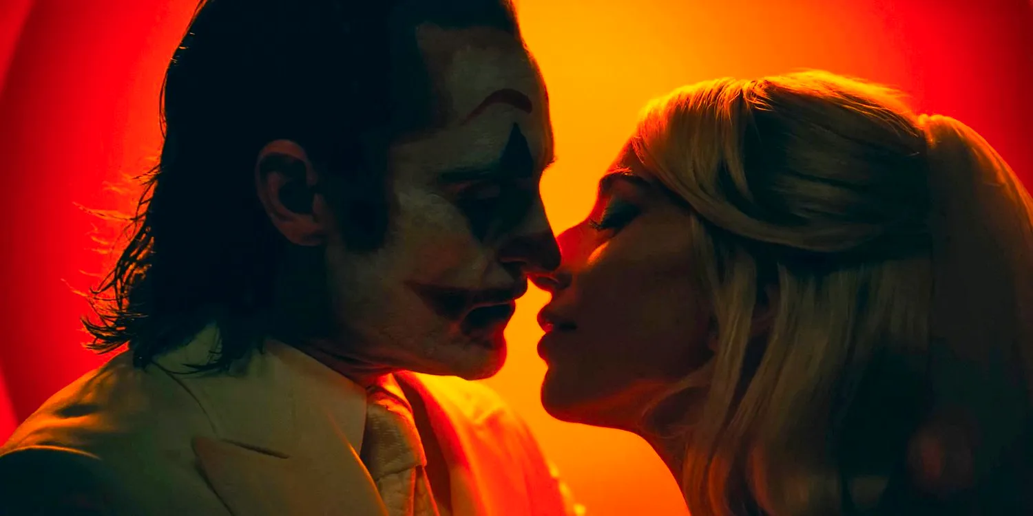 Joker and Harley Quinn about to kiss in Joker: Folie à Deux Image