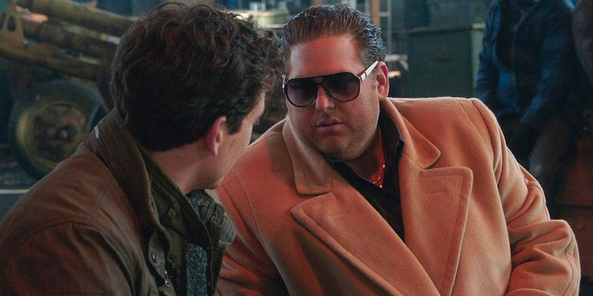 Jonah Hill as Efraim Diveroli wearing sunglasses in War Dogs Image