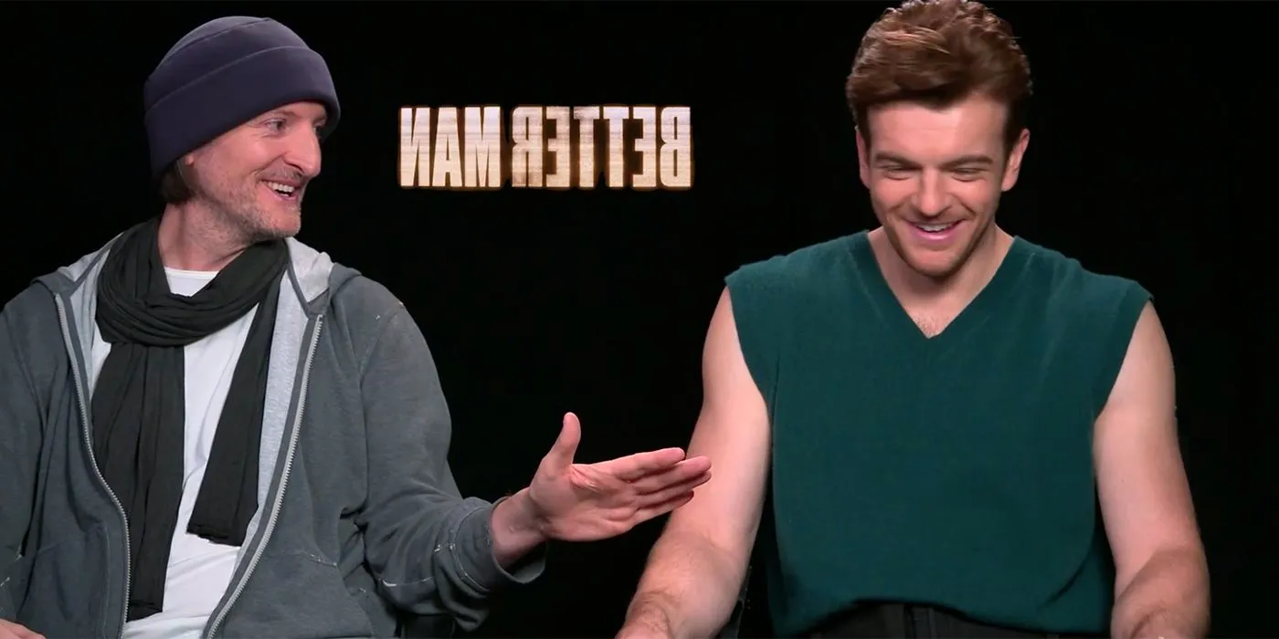 Jonno Davies & Michael Gracey laughing during Better Man interview Image