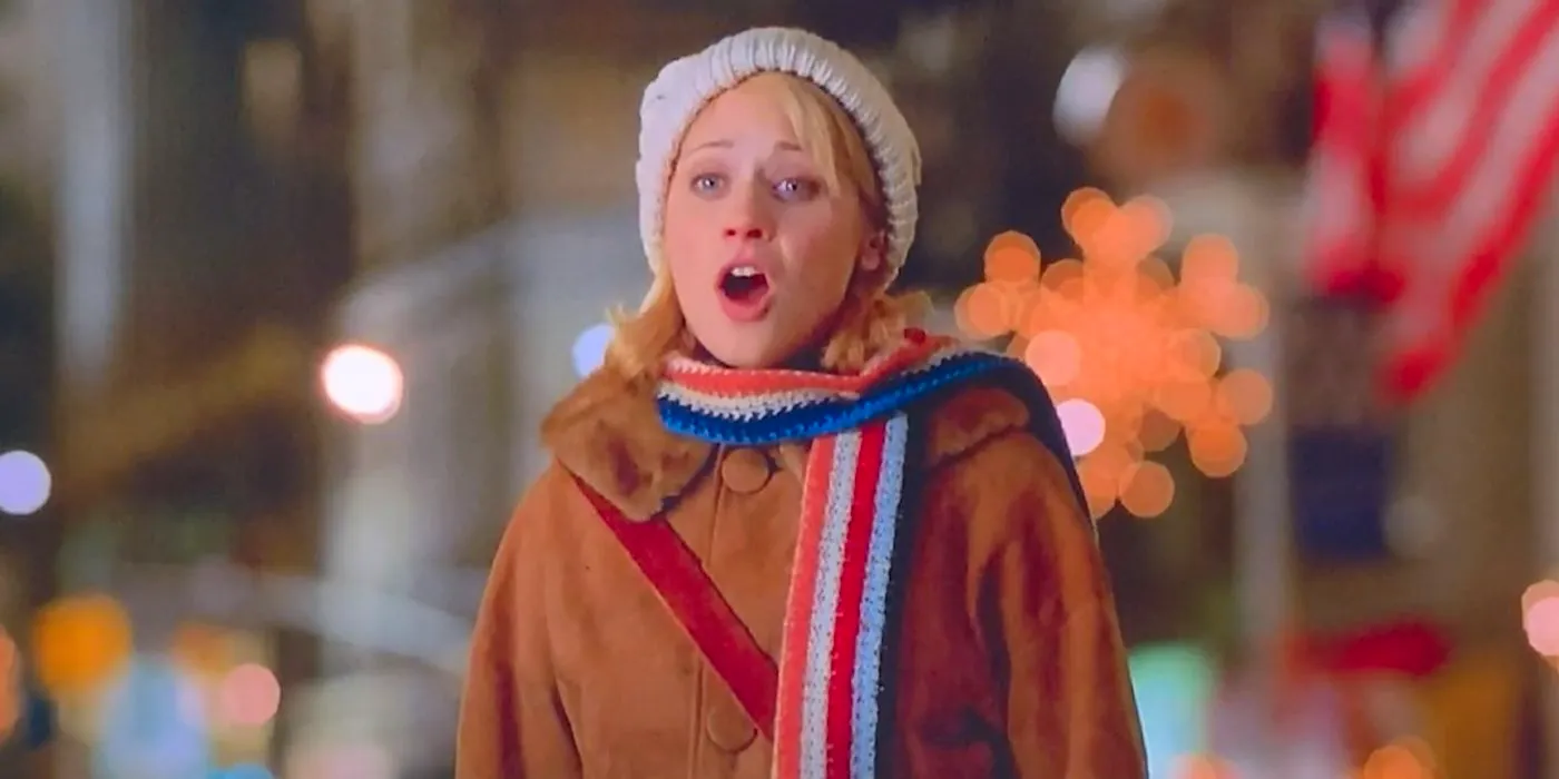 Jovie (Zooey Deschanel) singing in public in Elf. Image