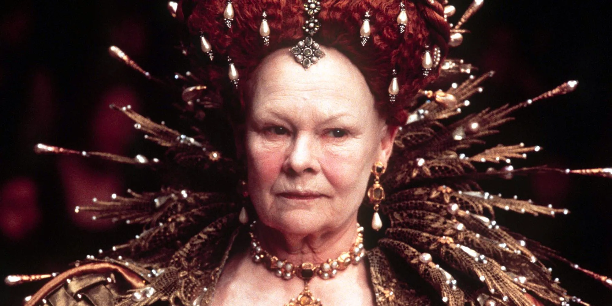 Judi Dench in royal garb in Shakespeare in Love Image