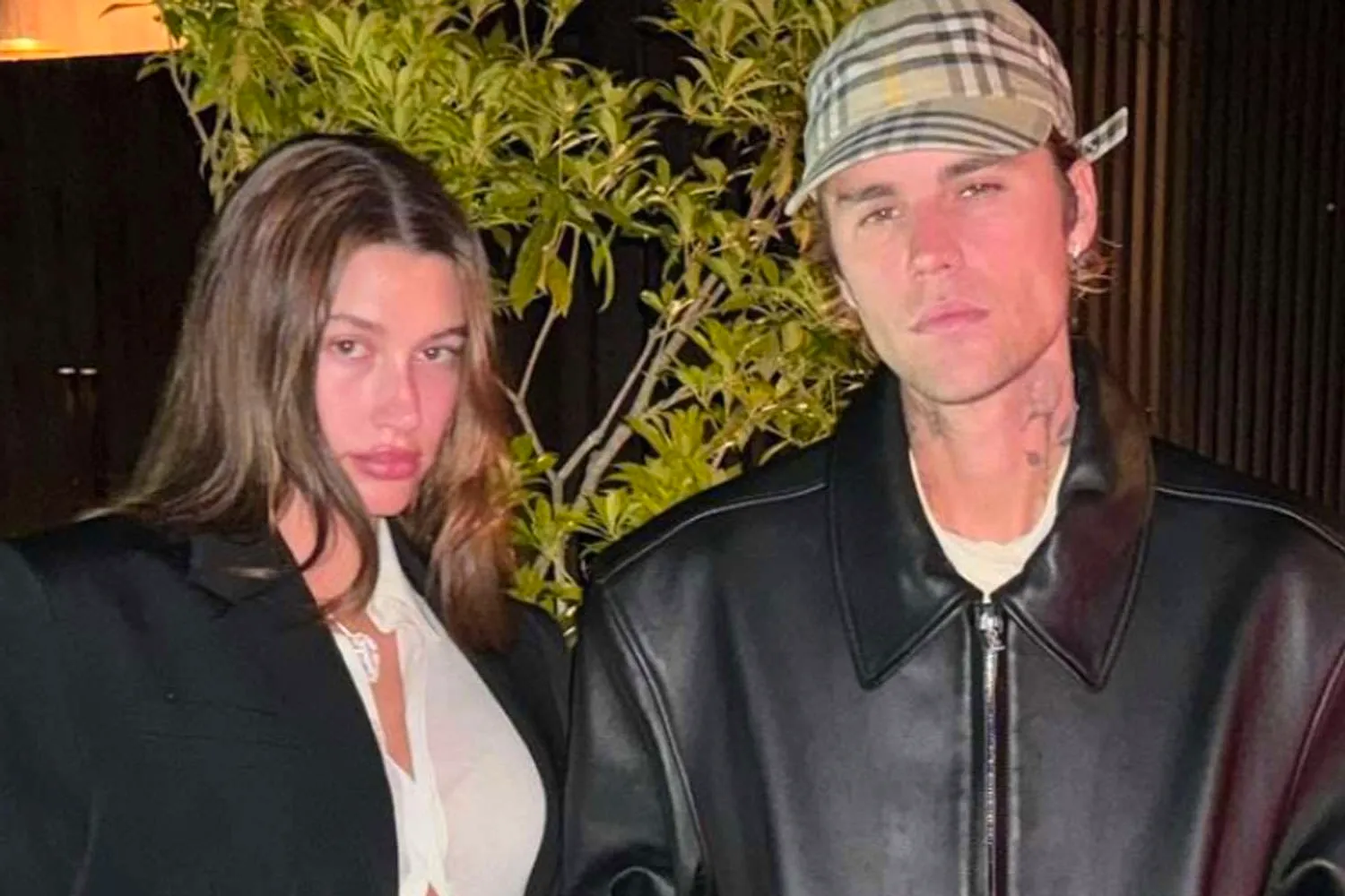 Justin Bieber Kisses Wife Hailey in New Photos of Him Teasing a Potential Music Comeback Image