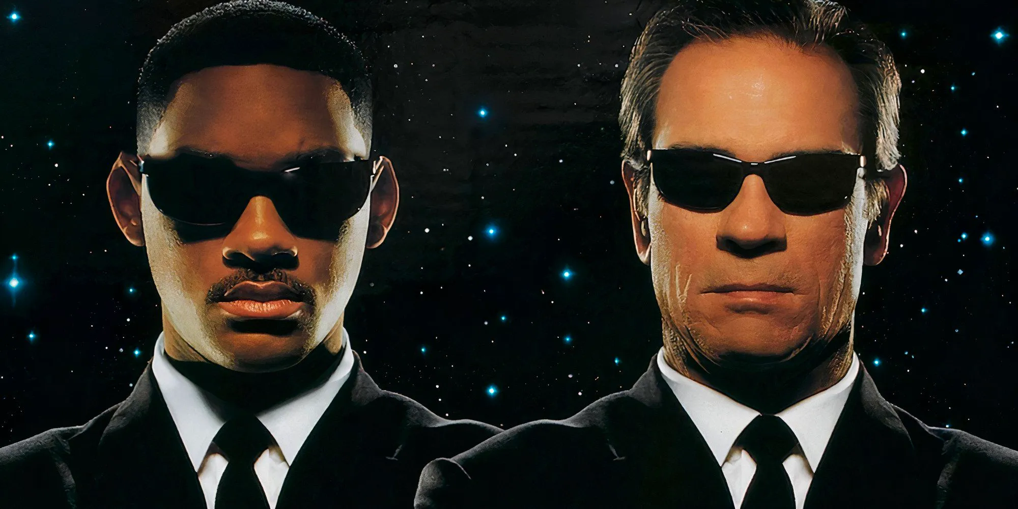 K and J in sunglasses and suits looking serious for the Men In Black poster cropped Image