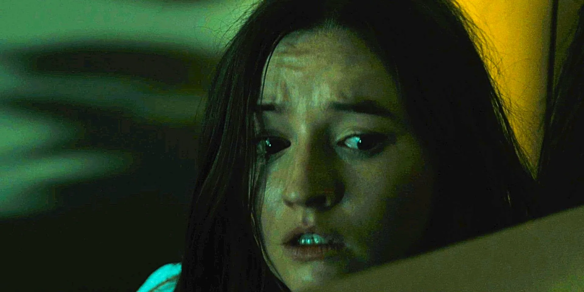 Kaitlyn Dever looking scared in No One Will Save You Image